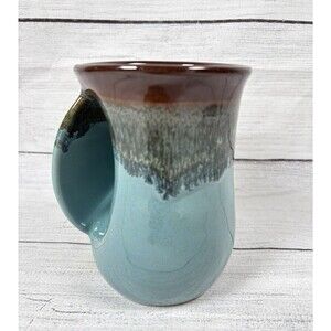 Drip Glaze Pottery Mug Hand Warmer Neher Teal Brown Left Hand 2022 14oz